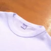 fabrica mayorista remeras lisas para niños y niñas blanca cerca cuello